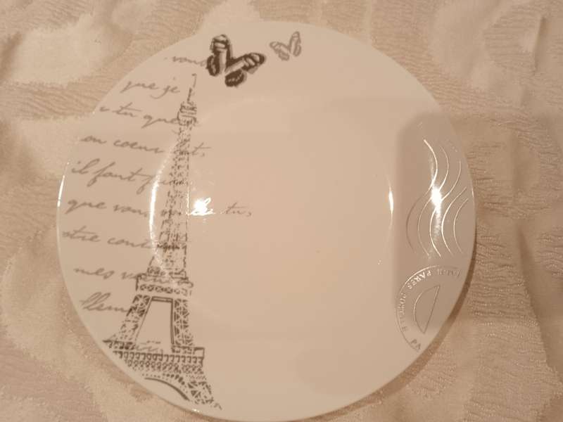 PARIS THEME DINNER SET (WAS 16 PIECE BUT NOW 14 PIECE BECAUSE TWO DINNER PLATES BROKE)