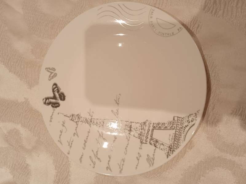 PARIS THEME DINNER SET (WAS 16 PIECE BUT NOW 14 PIECE BECAUSE TWO DINNER PLATES BROKE)