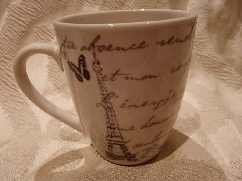 PARIS THEME DINNER SET (WAS 16 PIECE BUT NOW 14 PIECE BECAUSE TWO DINNER PLATES BROKE)