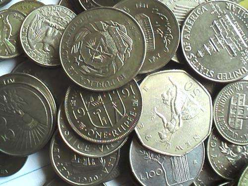 Lot of 85 silver toned international coins
