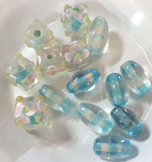 2 different lots of glass beads, 61 in total