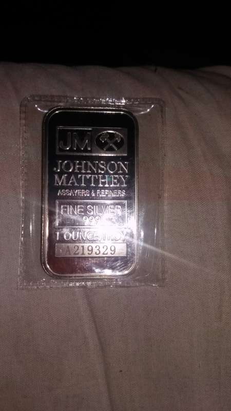 silver 1oz bar with serial number