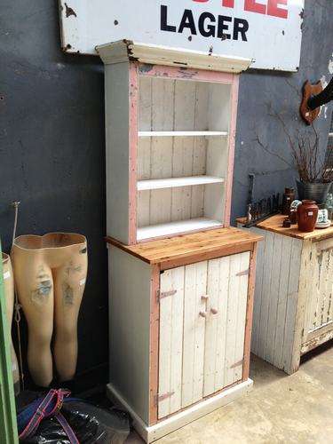 Shabby chic kitchen cupboard with a touch of pink