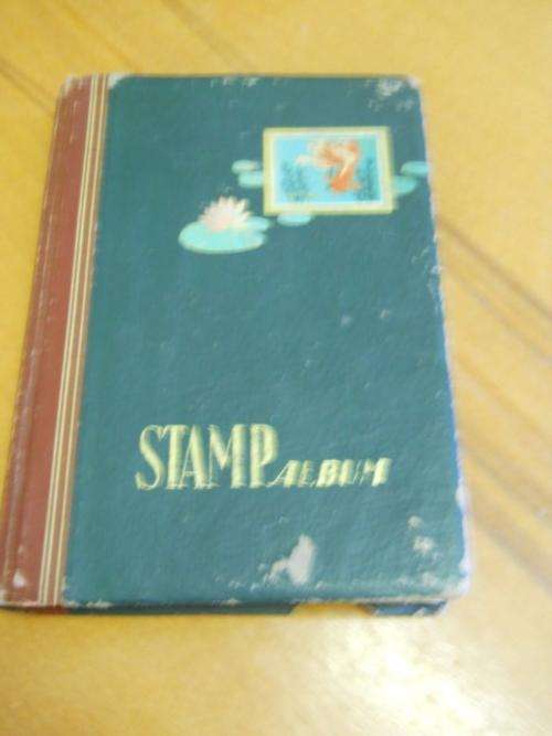 R1 NO RESERVE!!  14 PAGE STAMP ALBUM WITH STAMPS.