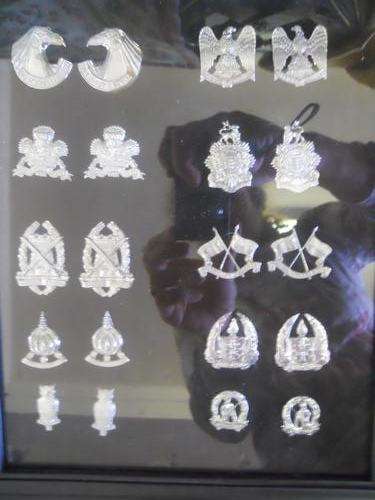some beautiful badges what are these?mounted and framed ref no 8