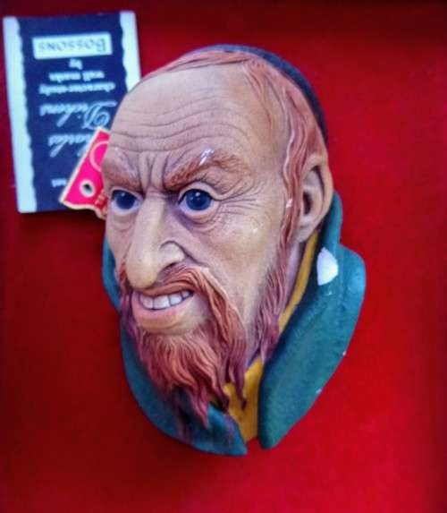 Four Charles Dickens Bosson character heads