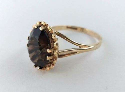 9 carat gold ring set with large rich brown topaz (1970s)