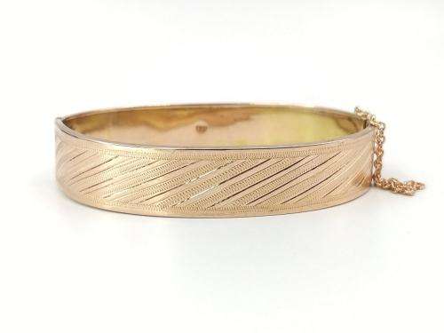 Spectacular 9ct rose gold hinged bangle (solid)