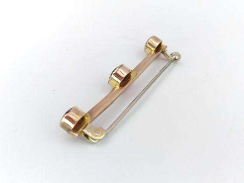 Art Deco garnet bar brooch (9ct gold)