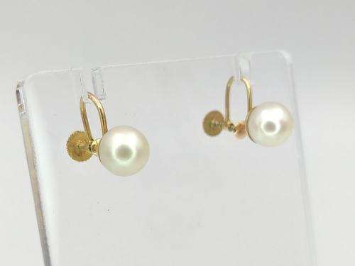 Pearl earrings set in 9ct gold