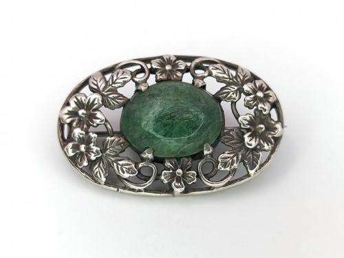 Arts and Crafts sterling silver flower brooch