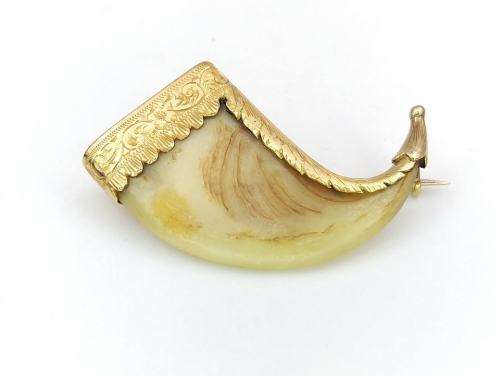 Anglo-Indian tiger`s claw brooch (set in 9ct gold)