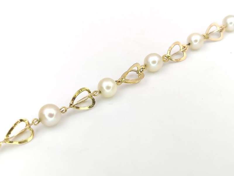 Pretty 14ct gold heart shaped link pearl bracelet