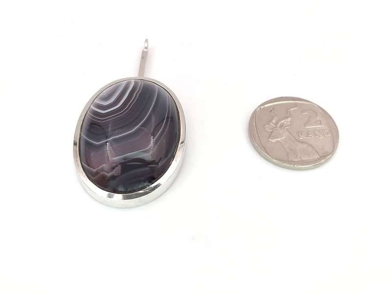Sterling silver banded agate pendant by South African silversmith George Xanthides
