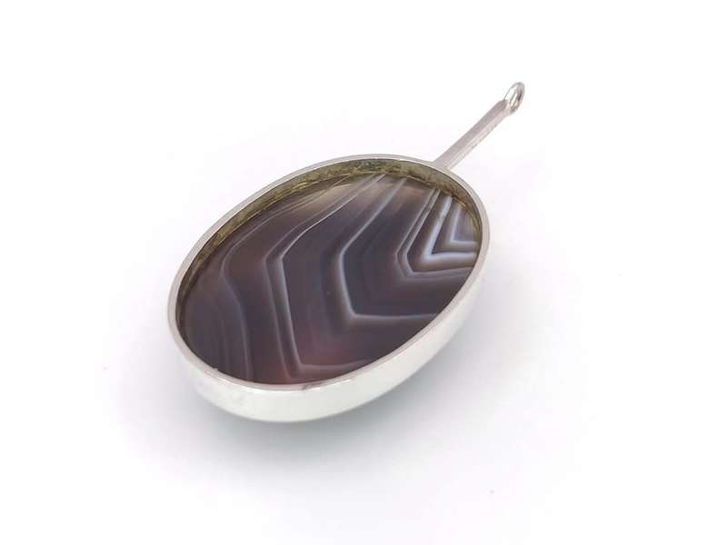 Sterling silver banded agate pendant by South African silversmith George Xanthides
