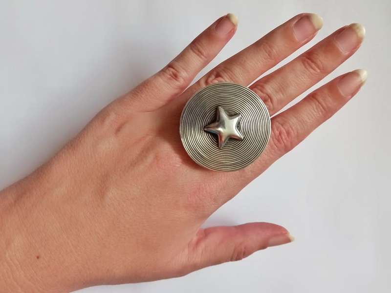 Designer statement star ring by Swiss silversmith Ulrich