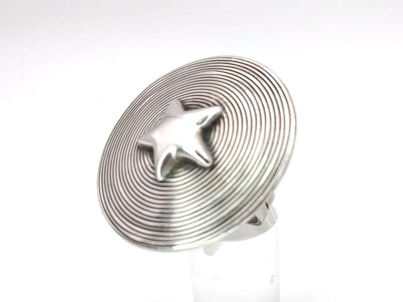 Designer statement star ring by Swiss silversmith Ulrich