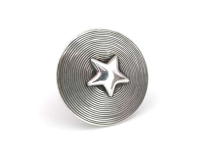 Designer statement star ring by Swiss silversmith Ulrich