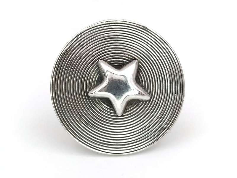 Designer statement star ring by Swiss silversmith Ulrich