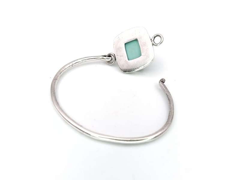 Genuine turquoise sterling silver hinged bangle