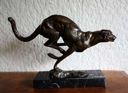 Beautiful bronze sculpture of a sprinting cheetah