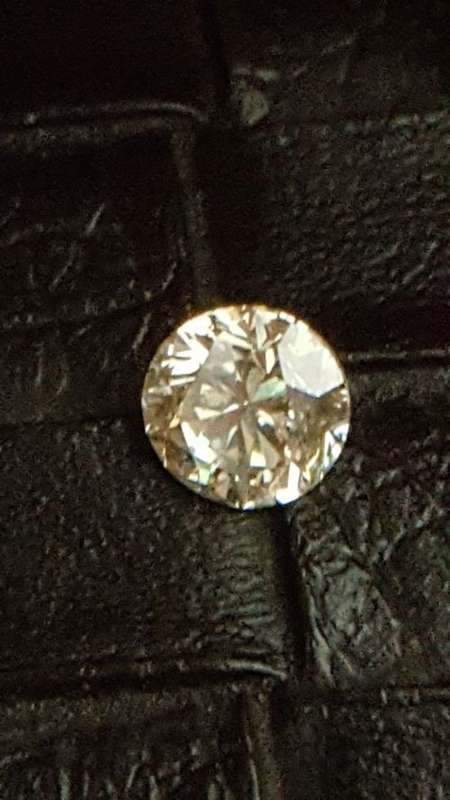 Cert 0.82Cts  Fancy Yellow VS2 Round Brilliant Natural Diamond
