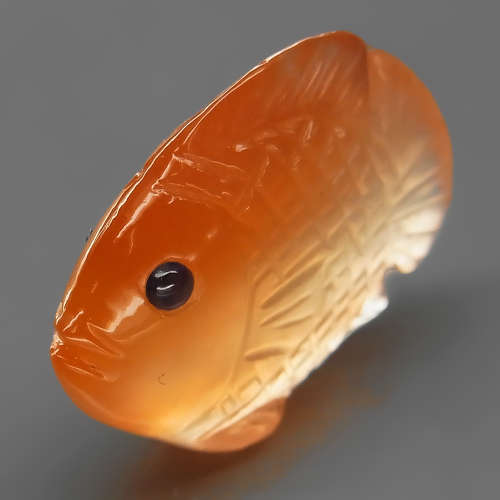 19.78Ct.Natural Orange Agate  Blue Sapphire Eyes Fish Carving