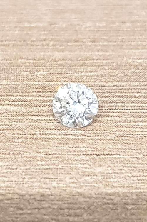 0.20Cts  DIAMOND SPARKLING E/VS2 Round Cut `Certified`