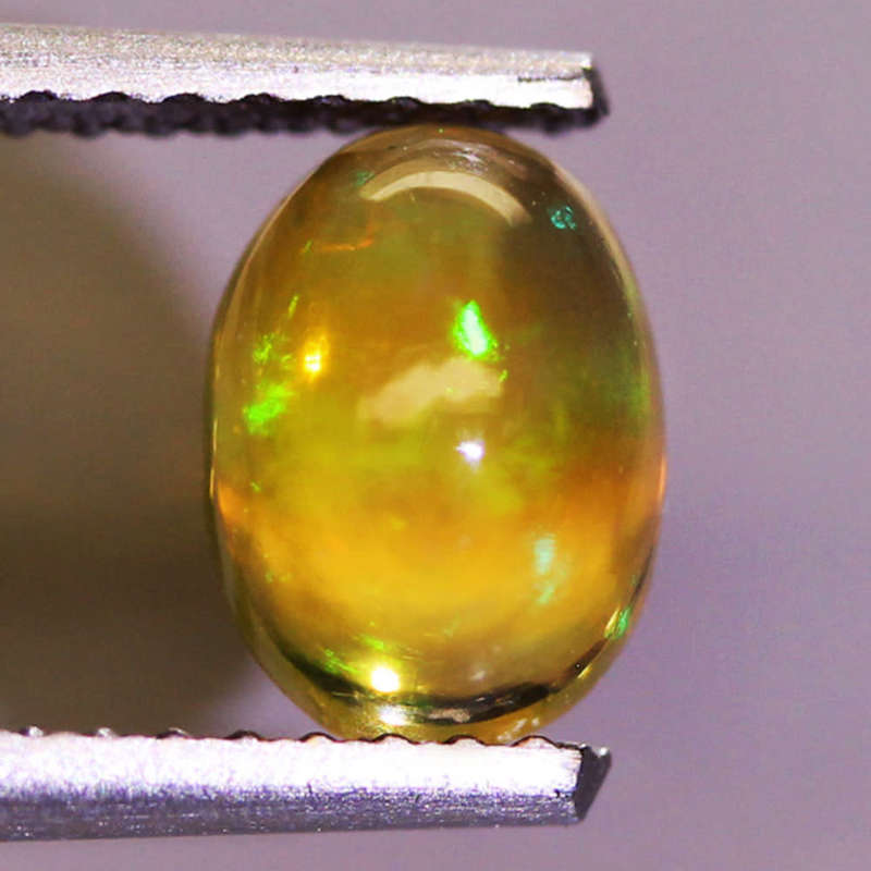 0.72Ct. Opal Oval Cabochon Multi Colours Glittering Rainbow 3D! Ethiopian Natural