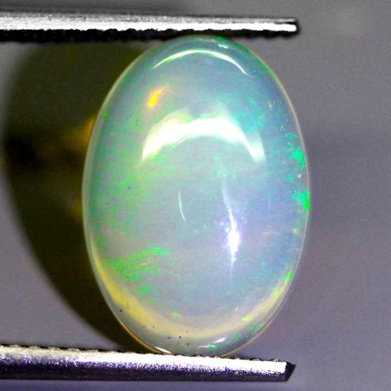 2.78Ct. Opal Oval Cabochon Multi Colours Glittering Rainbow 3D! Ethiopian Natural