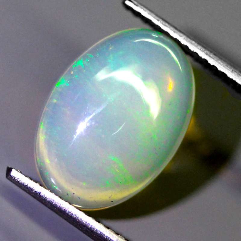 2.78Ct. Opal Oval Cabochon Multi Colours Glittering Rainbow 3D! Ethiopian Natural