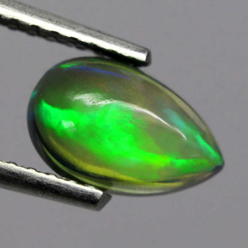 0.68Ct. Opal Pear Cabochon Multi Colours Glittering Rainbow 3D! Ethiopian Natural