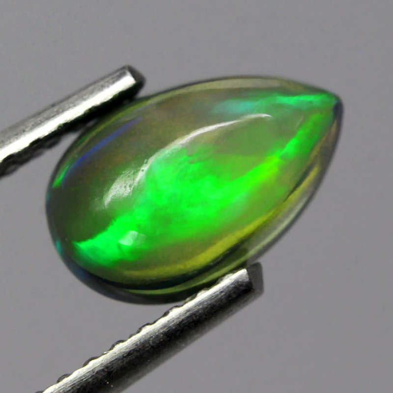 0.68Ct. Opal Pear Cabochon Multi Colours Glittering Rainbow 3D! Ethiopian Natural