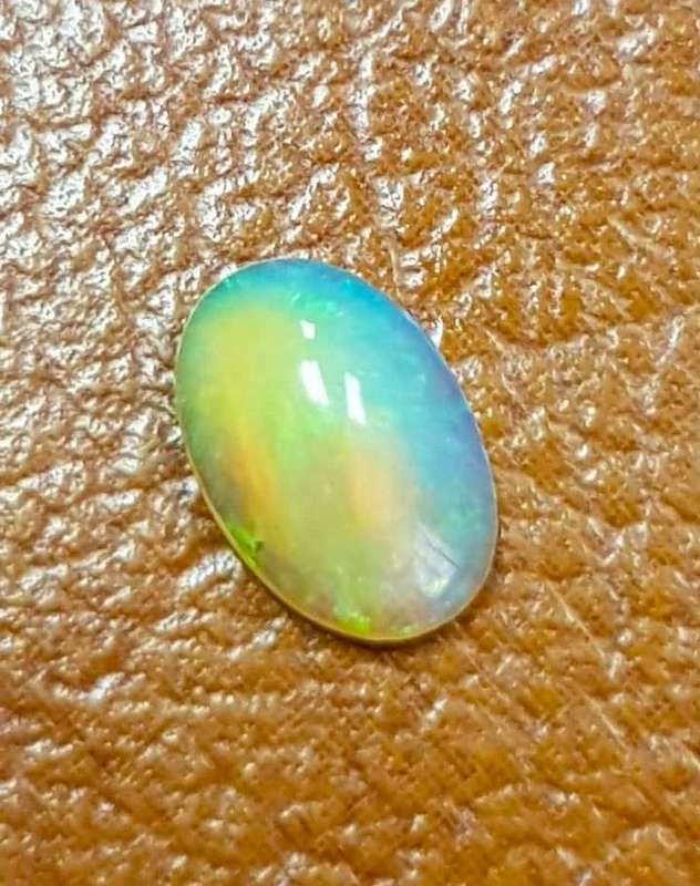 0.73Ct. Opal Oval Cabochon **Multi Colours**Glittering Rainbow 3D! Ethiopian Natural