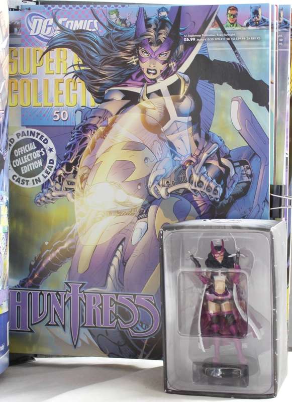 DC comics - lead, hand painted figurine with book - Huntress #50