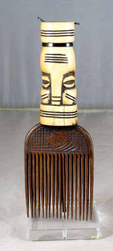 African Comb With Carved Bone Handle on Stand