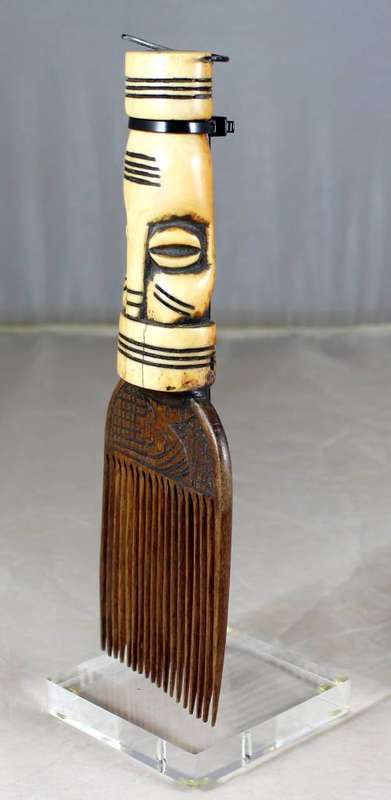 African Comb With Carved Bone Handle on Stand