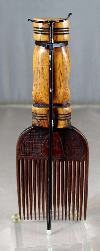 African Comb With Carved Bone Handle on Stand