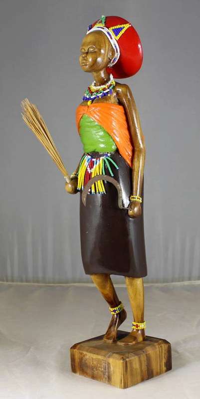 HR Mbhele - Woman With Baby holding sickle and broom