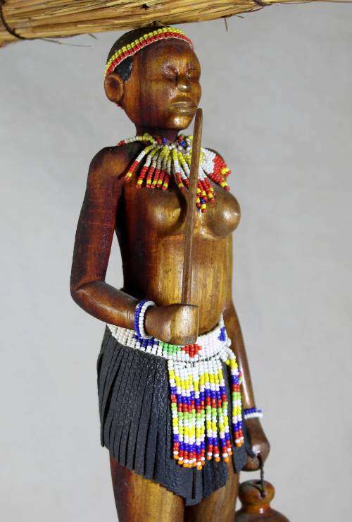 HR Mbhele - Woman Carrying Large Bundle of Reeds