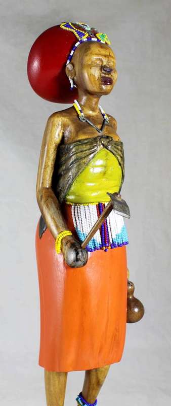 HR Mbhele - Traditional Mother and Child Carrying a Hoe