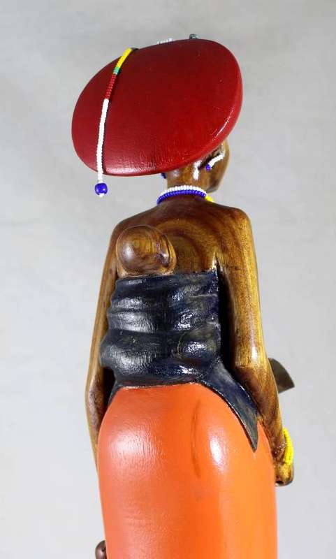 HR Mbhele - Traditional Mother and Child Carrying a Hoe