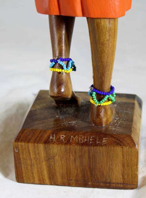 HR Mbhele - Traditional Mother and Child Carrying a Hoe