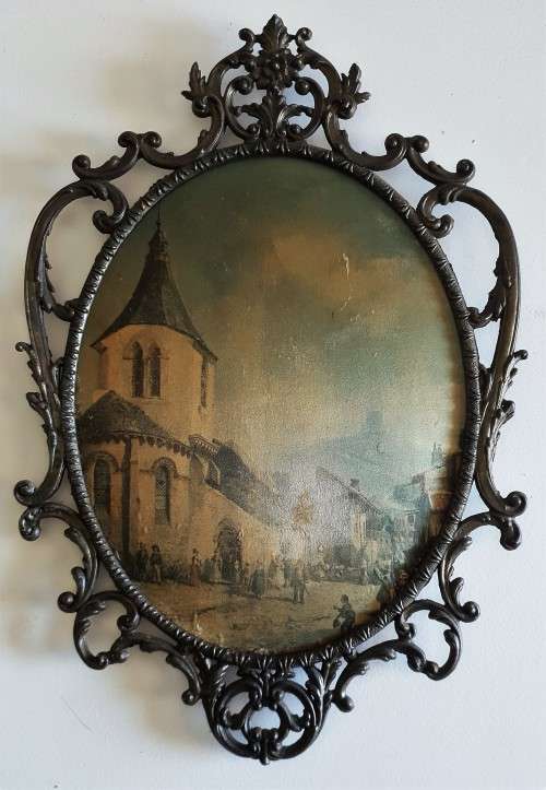 Vintage metal frame with a domed glass and painted on silk picture.