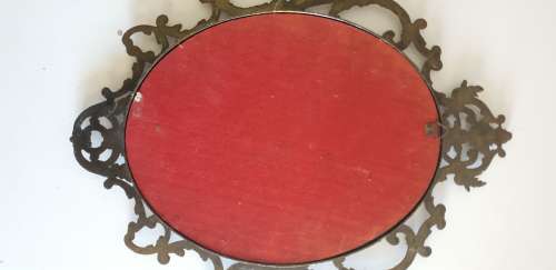 Vintage metal frame with a domed glass and painted on silk picture.