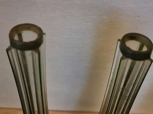 Beautiful vintage eifel tower style short vases. They have a metal band on the top.
