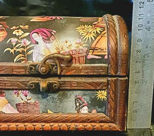 Silk inlaid wooden jewelry box.