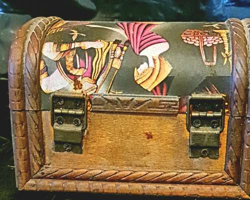 Silk inlaid wooden jewelry box.