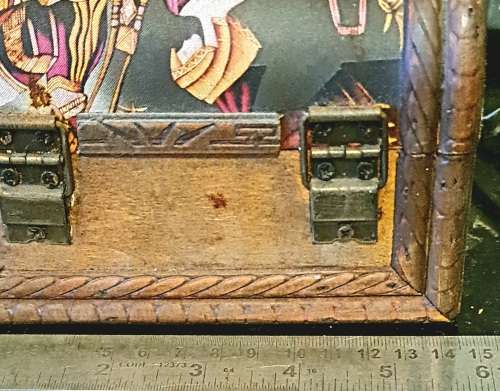 Silk inlaid wooden jewelry box.
