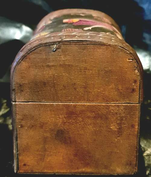 Silk inlaid wooden jewelry box.